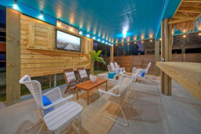 Outdoor Lounge w Bar Swing Seats Near Nature Preserve Blutopia by AvantStay
